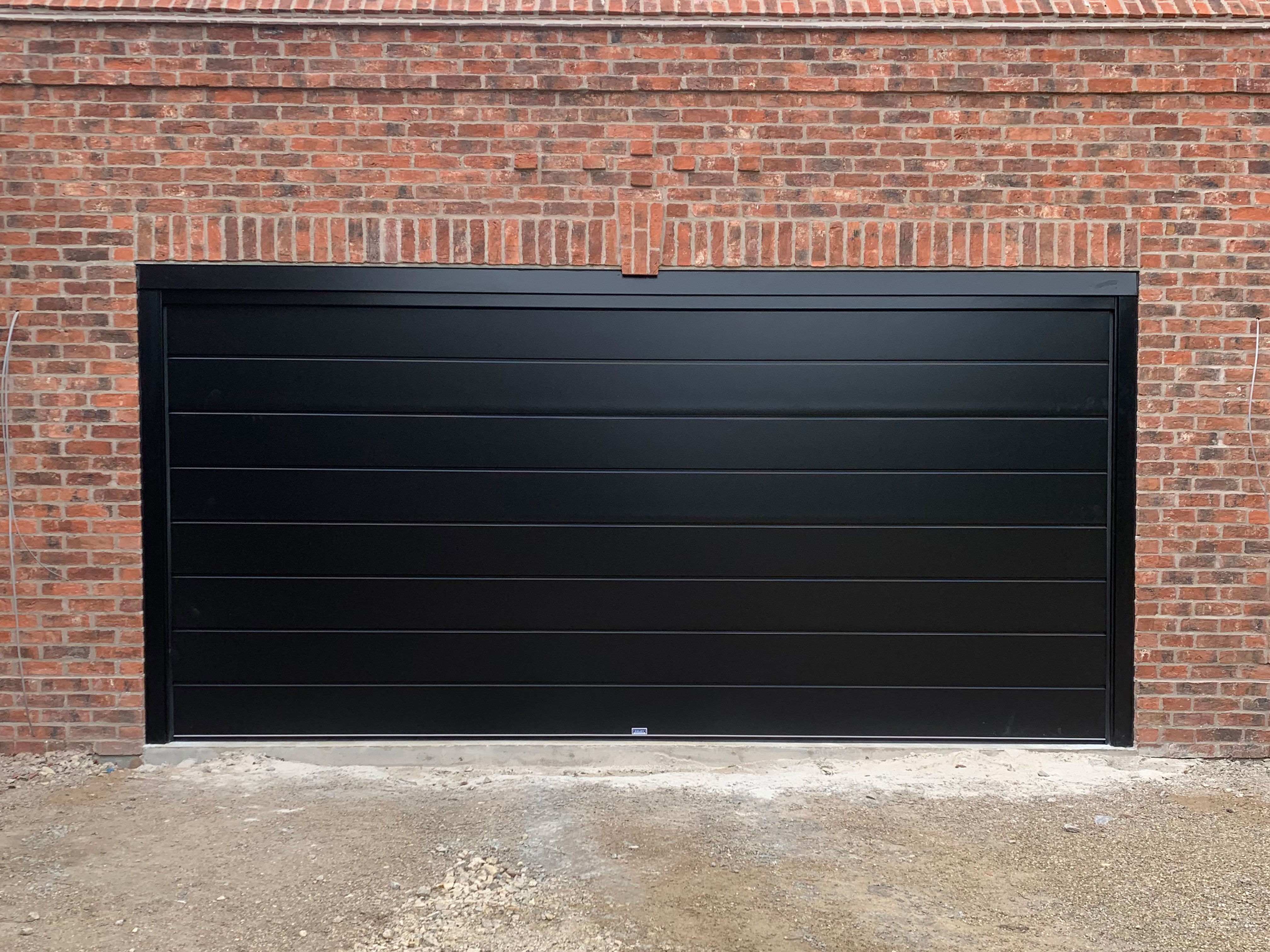 Black Centre Ribbed Sectional Garage Door, Harrogate