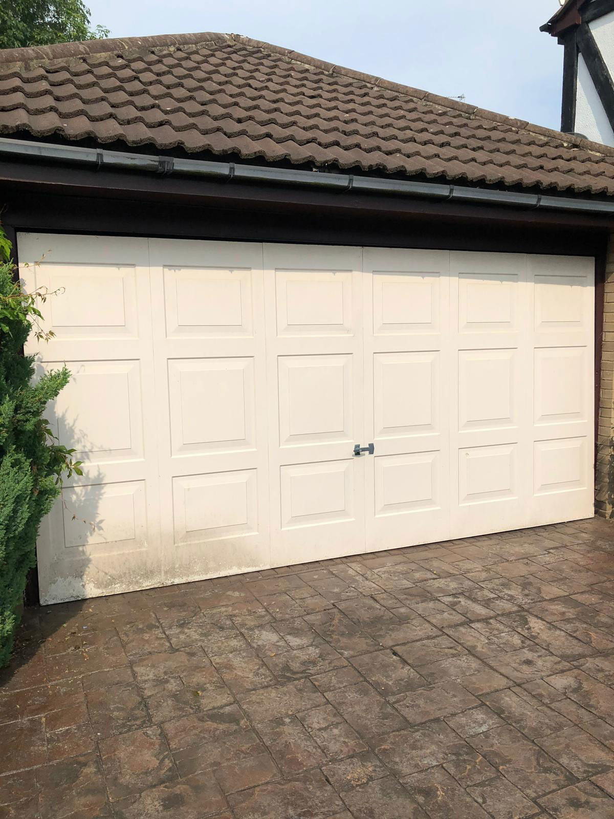 Cream Centre Ribbed Sectional Garage Door, South Manchester & Cheshire