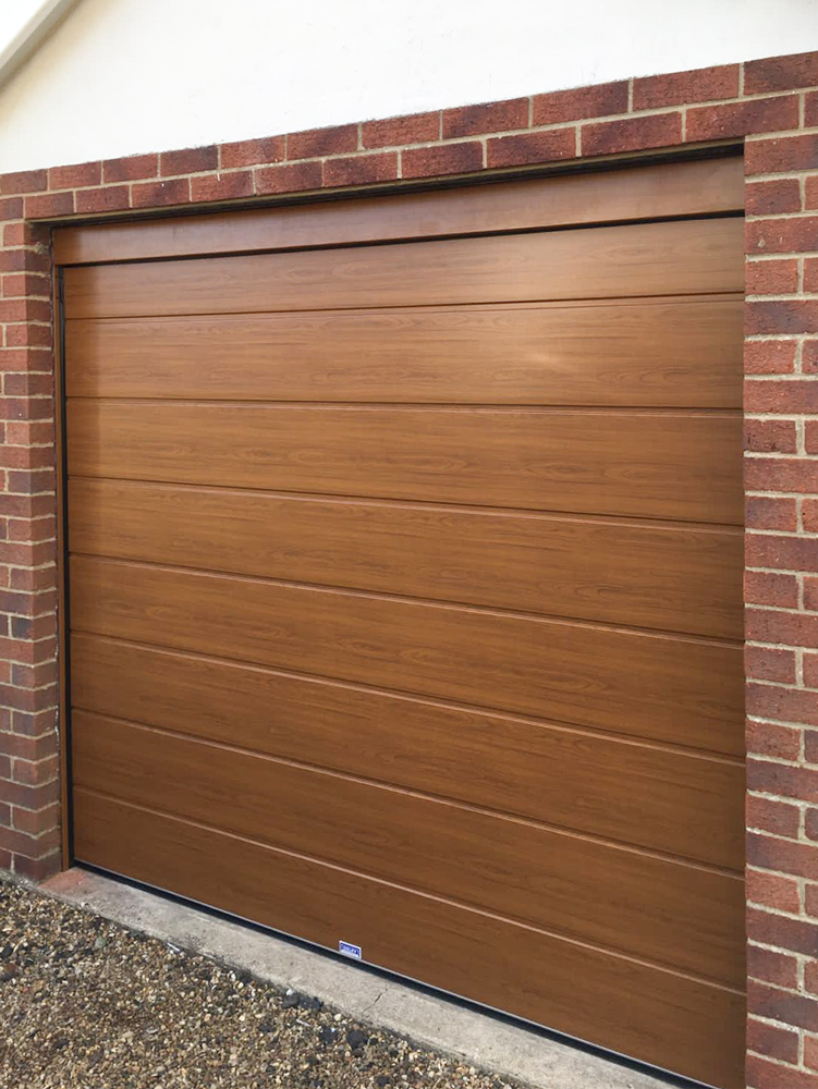 Insulated Sectional Garage Door in Golden Oak, Preston