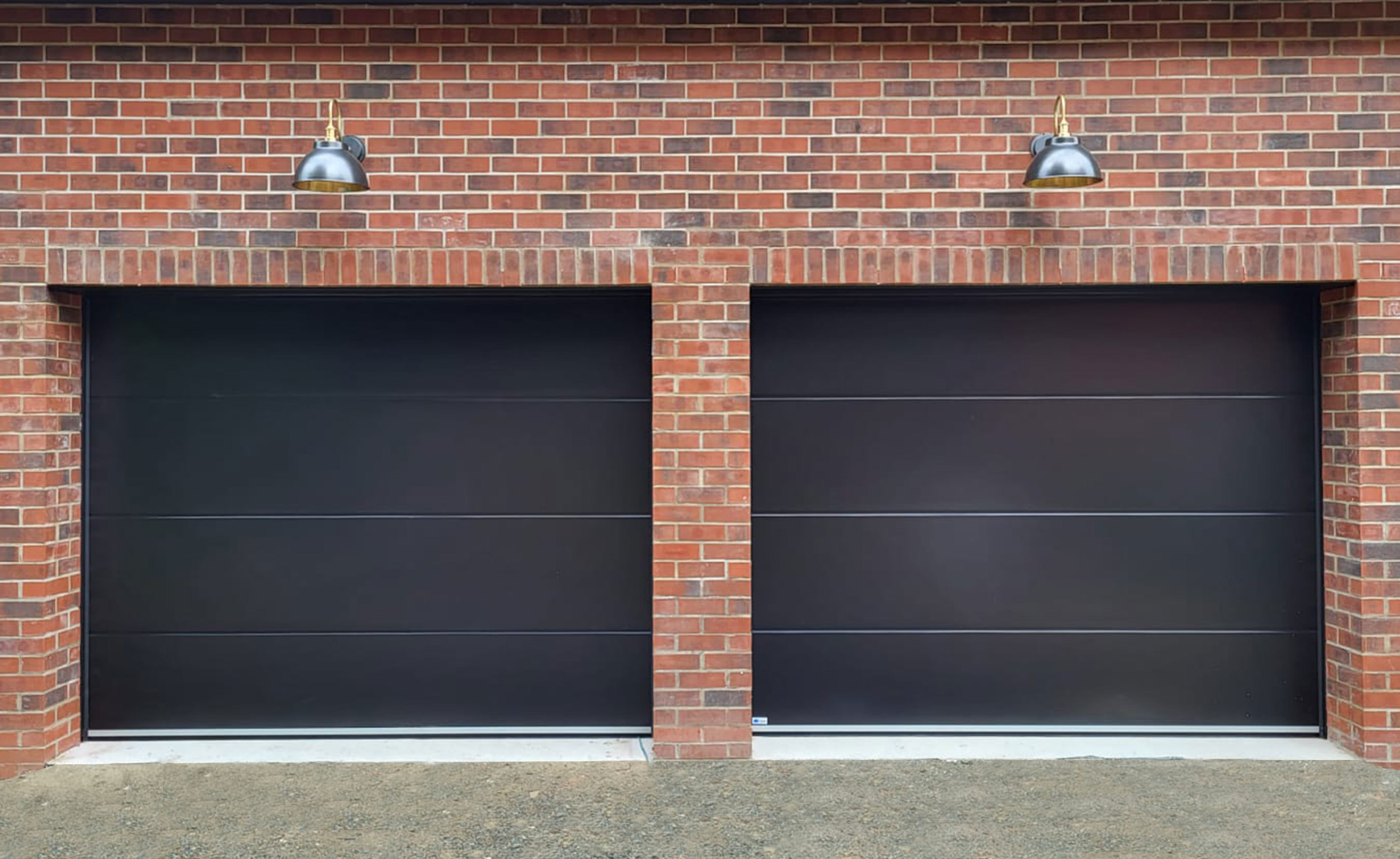 Pair Of Black Insulated Ribbed Sectional Garage Doors, Fife