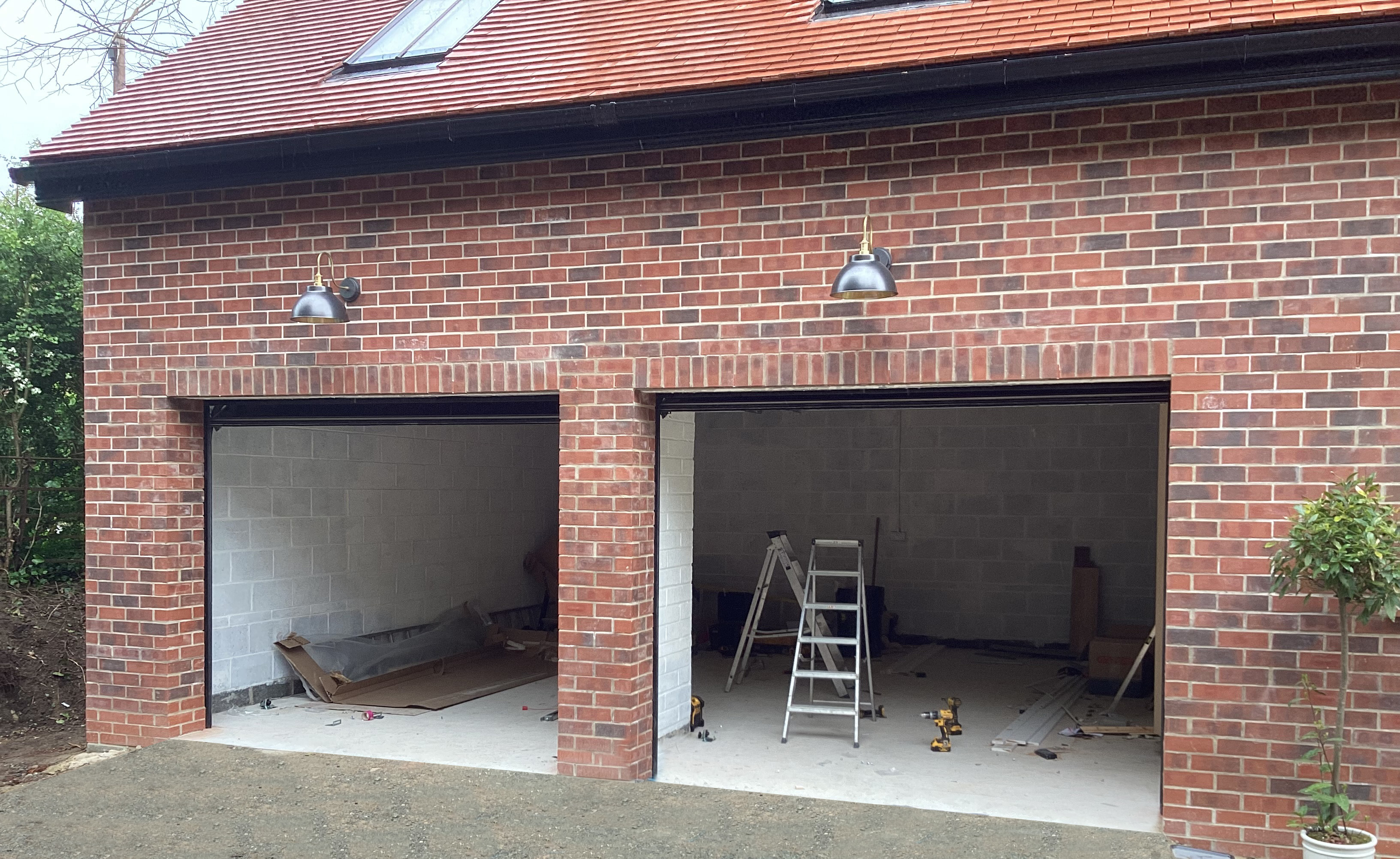 Pair Of Black Insulated Ribbed Sectional Garage Doors, Fife