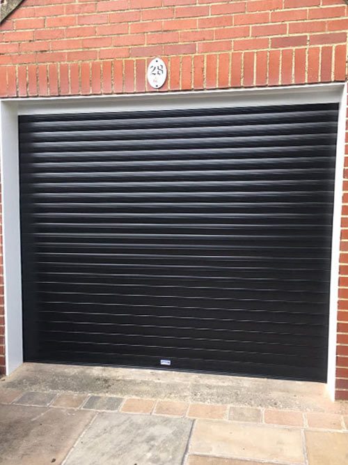 Insulated Roller Garage Door in Black, Bolton