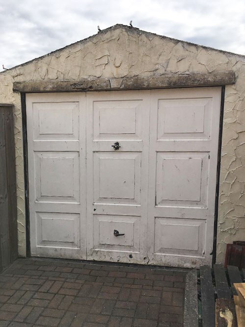 Standard Rib insulated Sectional Garage Door in Golden Oak, Bury