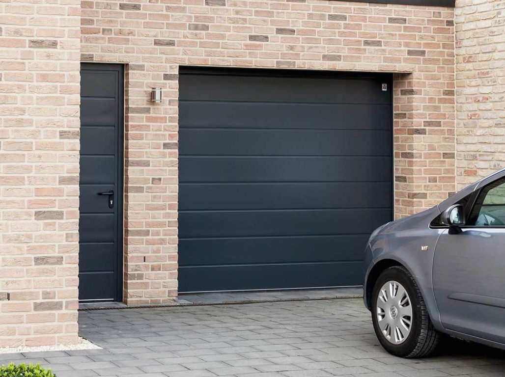 Oxley Centre Ribbed Sectional Garage Door Finished In Anthracite Grey