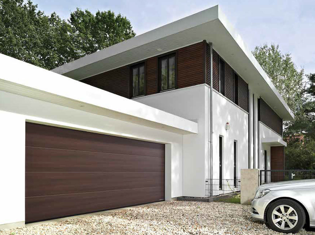 Oxley Designer Insulated Sectional Garage Doors Finished in Terra Walnut