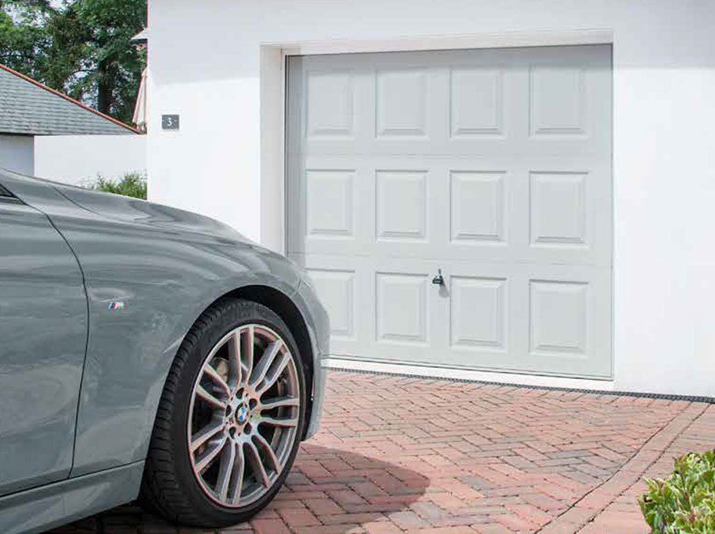 Oxley Steel Up & Over Garage Door In The Georgian Design Finished In Light Grey