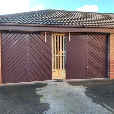 Centre Ribbed Rosewood Insulated Sectional Garage Door, Warrington
