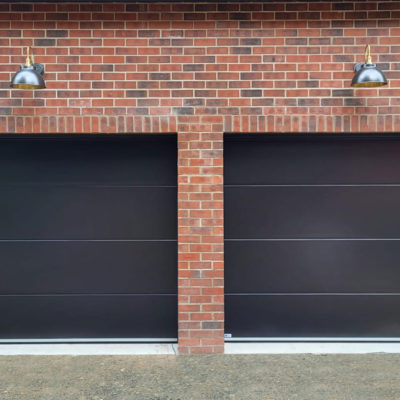 Pair Of Black Insulated Ribbed Sectional Garage Doors, Fife