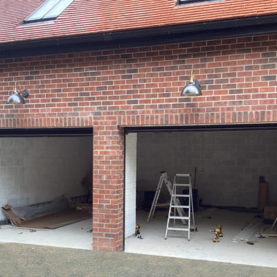 Pair Of Black Insulated Ribbed Sectional Garage Doors, Fife