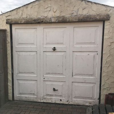 Standard Rib insulated Sectional Garage Door in Golden Oak, Bury